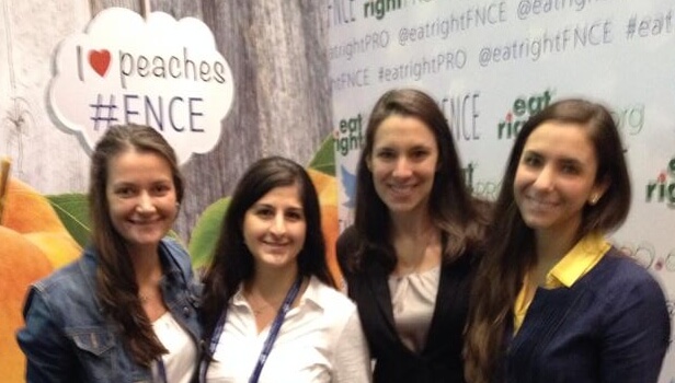 Part of the Pollock team at a FNCE® Selfie Station